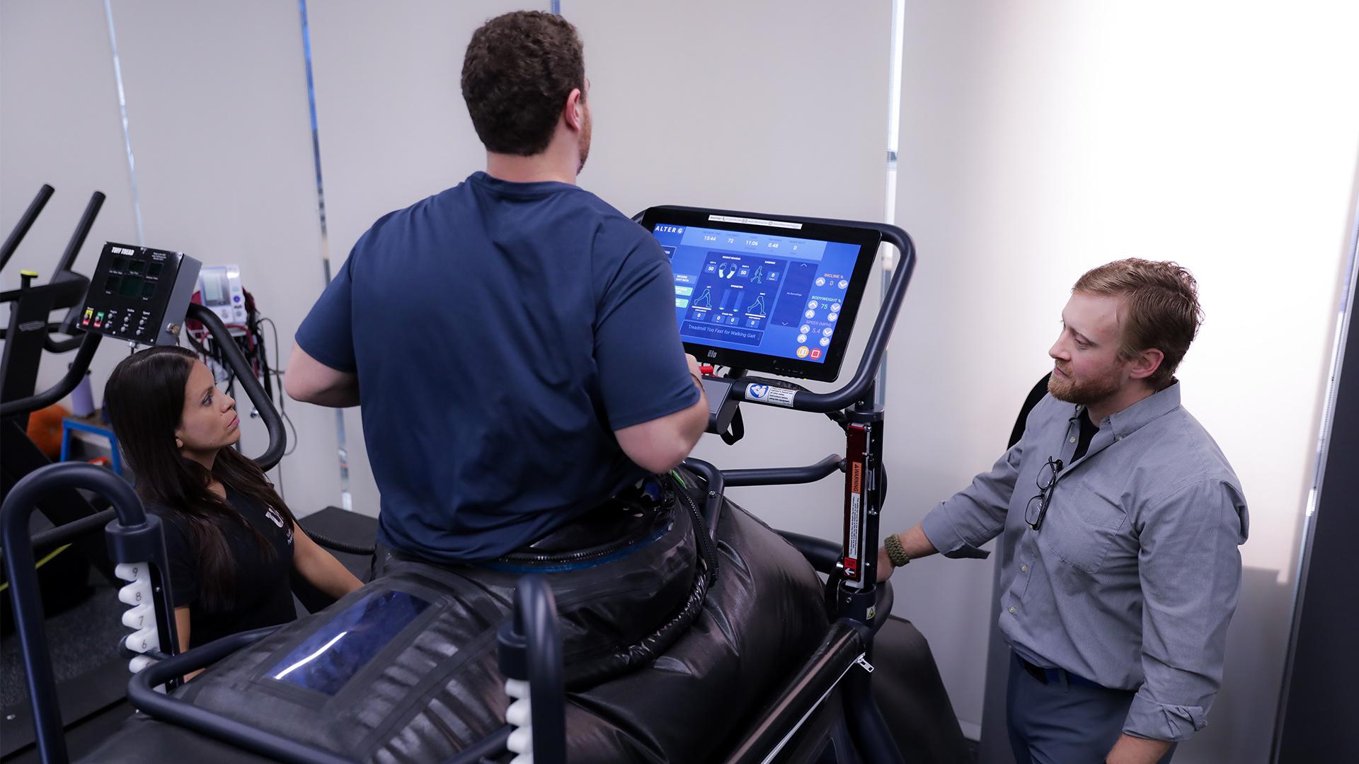 Program participants using treadmill