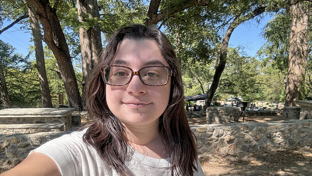 A person taking a selfie in an outdoor setting